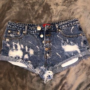 Distressed denim shorts